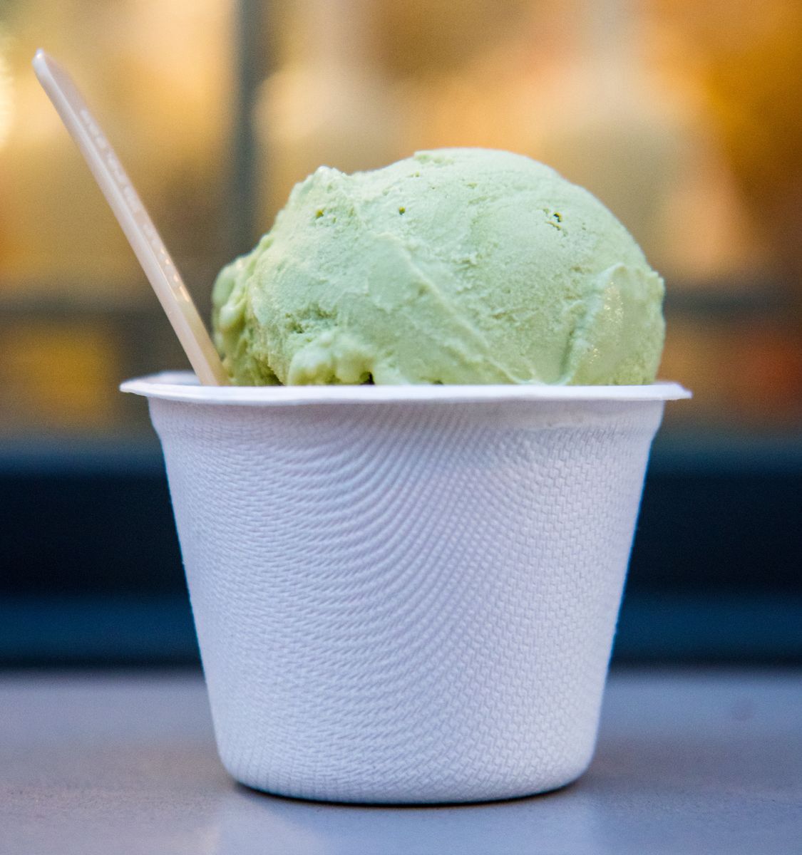 A scoop of ice cream in a cup.